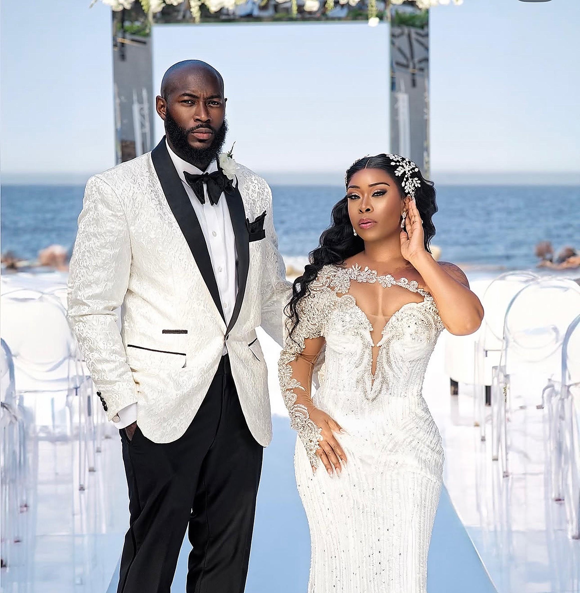 Destination wedding — beaded gown and styled hair at an oceanfront ceremony